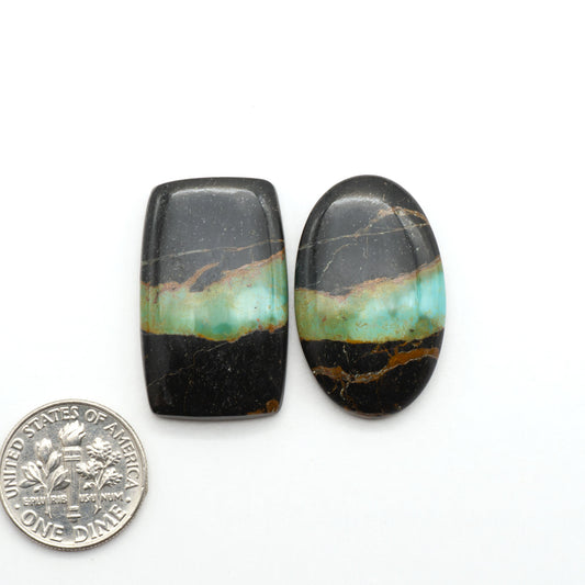 Black Jack Turquoise features a bold black color with striking veins of turquoise, making it a truly one-of-a-kind addition to your jewelry collection.