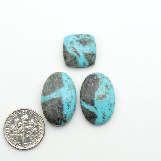 Nacozari turquoise cabochons are striking gemstones known for their vibrant blue to greenish-blue colors and pyrite, these stones are prized in jewelry making.