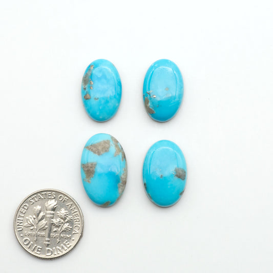 Nacozari turquoise cabochons are striking gemstones known for their vibrant blue to greenish-blue colors and pyrite, these stones are prized in jewelry making.