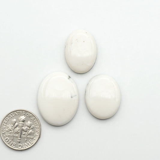 Natural White Buffalo Stone Cabochons are semi-precious gemstones cut into shapes ideal for jewelry-making, making them an excellent choice for artisans.