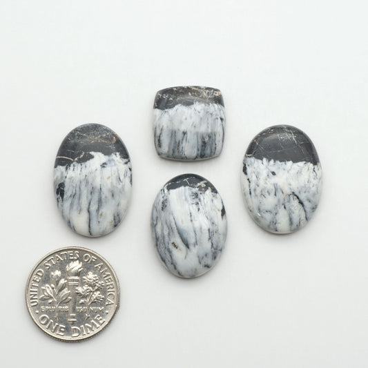 Natural White Buffalo Stone Cabochons are semi-precious gemstones cut into shapes ideal for jewelry-making, making them an excellent choice for artisans.