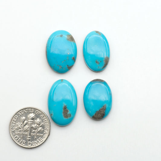 Nacozari turquoise cabochons are striking gemstones known for their vibrant blue to greenish-blue colors and pyrite, these stones are prized in jewelry making.