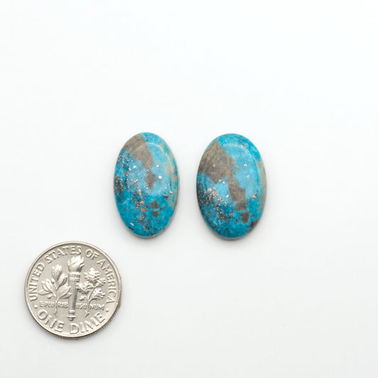 Nacozari turquoise cabochons are striking gemstones known for their vibrant blue to greenish-blue colors and pyrite, these stones are prized in jewelry making.
