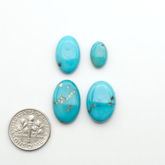 Nacozari turquoise cabochons are striking gemstones known for their vibrant blue to greenish-blue colors and pyrite, these stones are prized in jewelry making.