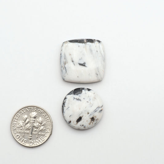 Natural White Buffalo Stone Cabochons are semi-precious gemstones cut into shapes ideal for jewelry-making, making them an excellent choice for artisans.