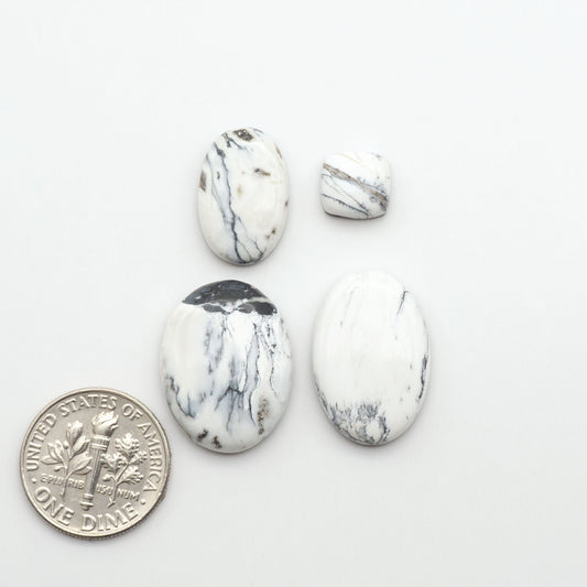 Natural White Buffalo Stone Cabochons are semi-precious gemstones cut into shapes ideal for jewelry-making, making them an excellent choice for artisans.