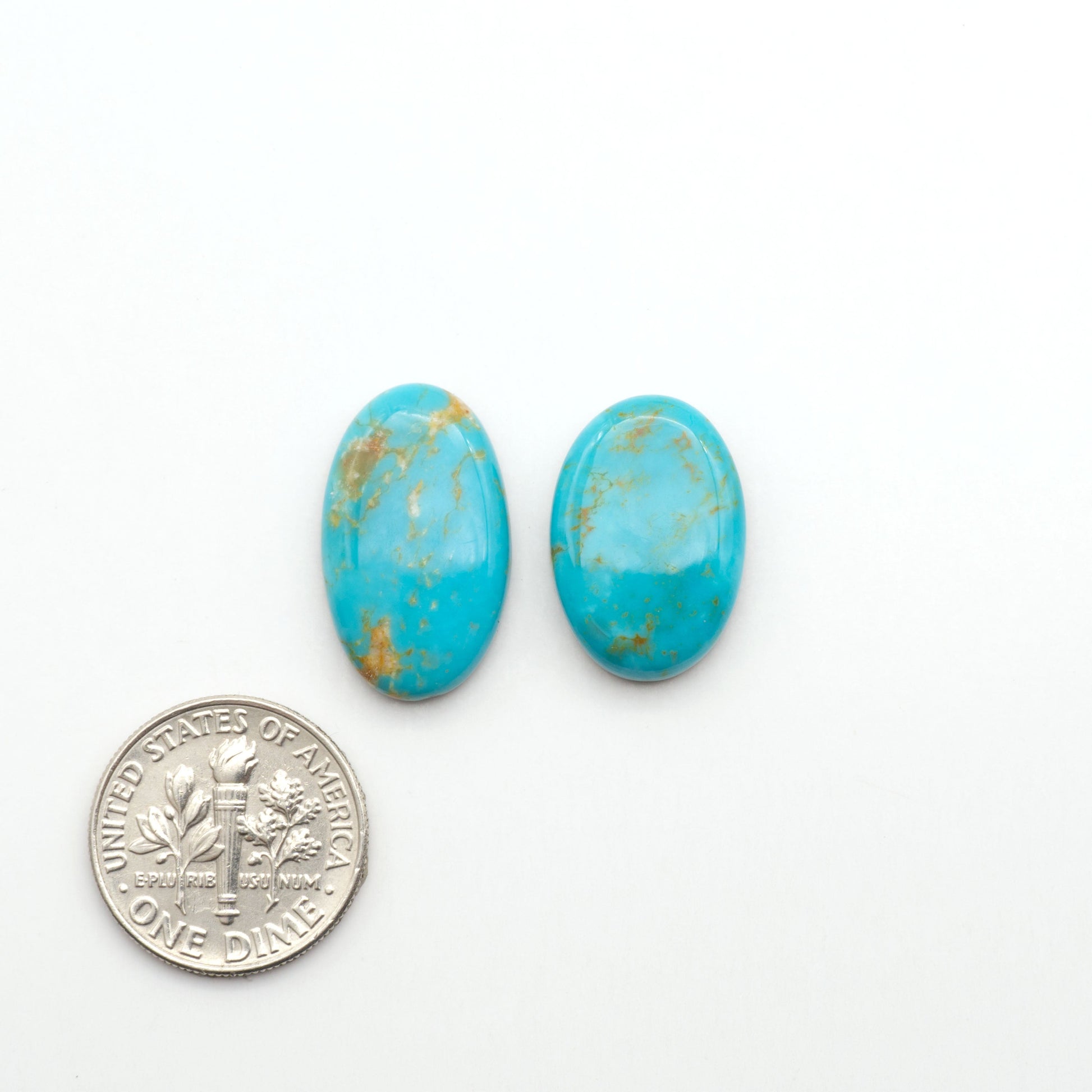 Nacozari turquoise cabochons are striking gemstones known for their vibrant blue to greenish-blue colors and pyrite, these stones are prized in jewelry making.