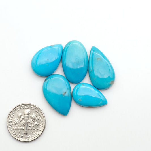 Nacozari turquoise cabochons are striking gemstones known for their vibrant blue to greenish-blue colors and pyrite, these stones are prized in jewelry making.