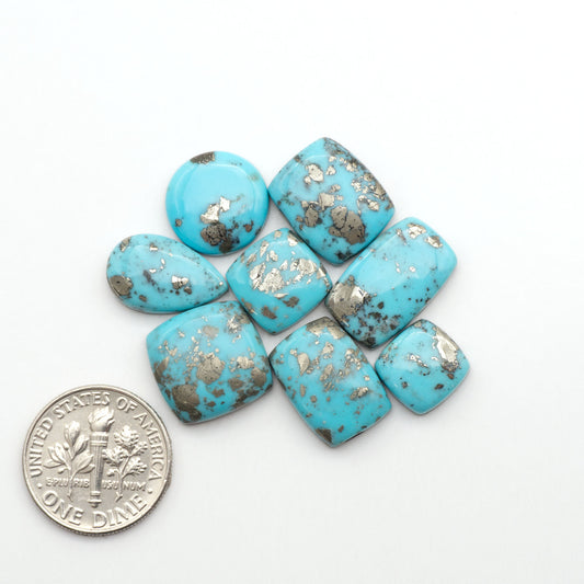 Nacozari turquoise cabochons are striking gemstones known for their vibrant blue to greenish-blue colors and pyrite, these stones are prized in jewelry making.