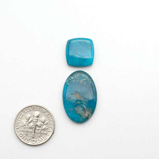 Nacozari turquoise cabochons are striking gemstones known for their vibrant blue to greenish-blue colors and pyrite, these stones are prized in jewelry making.