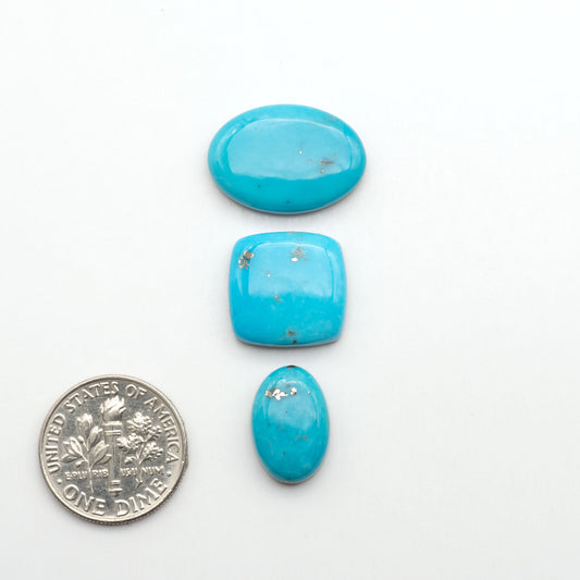 Nacozari turquoise cabochons are striking gemstones known for their vibrant blue to greenish-blue colors and pyrite, these stones are prized in jewelry making.