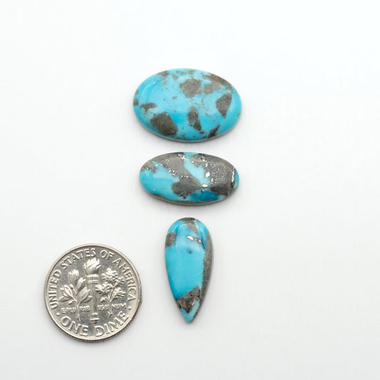 Nacozari turquoise cabochons are striking gemstones known for their vibrant blue to greenish-blue colors and pyrite, these stones are prized in jewelry making.