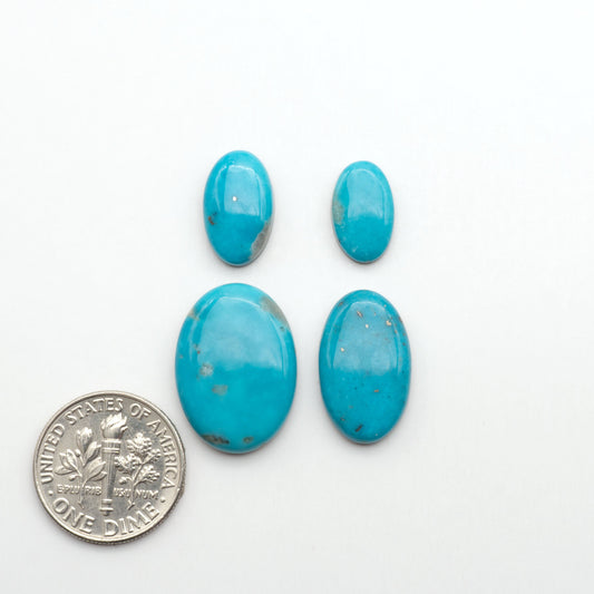 Nacozari turquoise cabochons are striking gemstones known for their vibrant blue to greenish-blue colors and pyrite, these stones are prized in jewelry making.