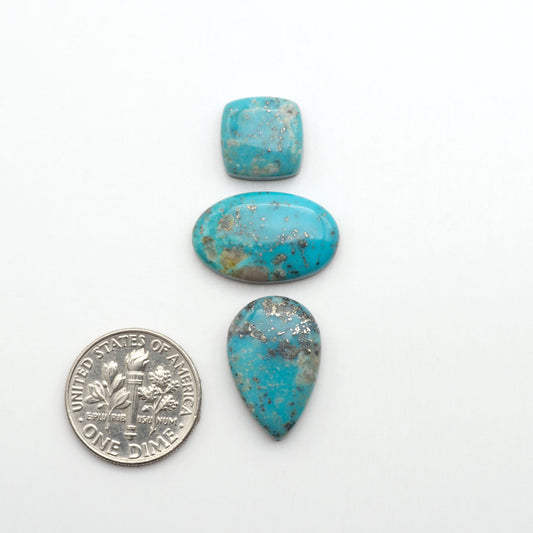 Nacozari turquoise cabochons are striking gemstones known for their vibrant blue to greenish-blue colors and pyrite, these stones are prized in jewelry making.