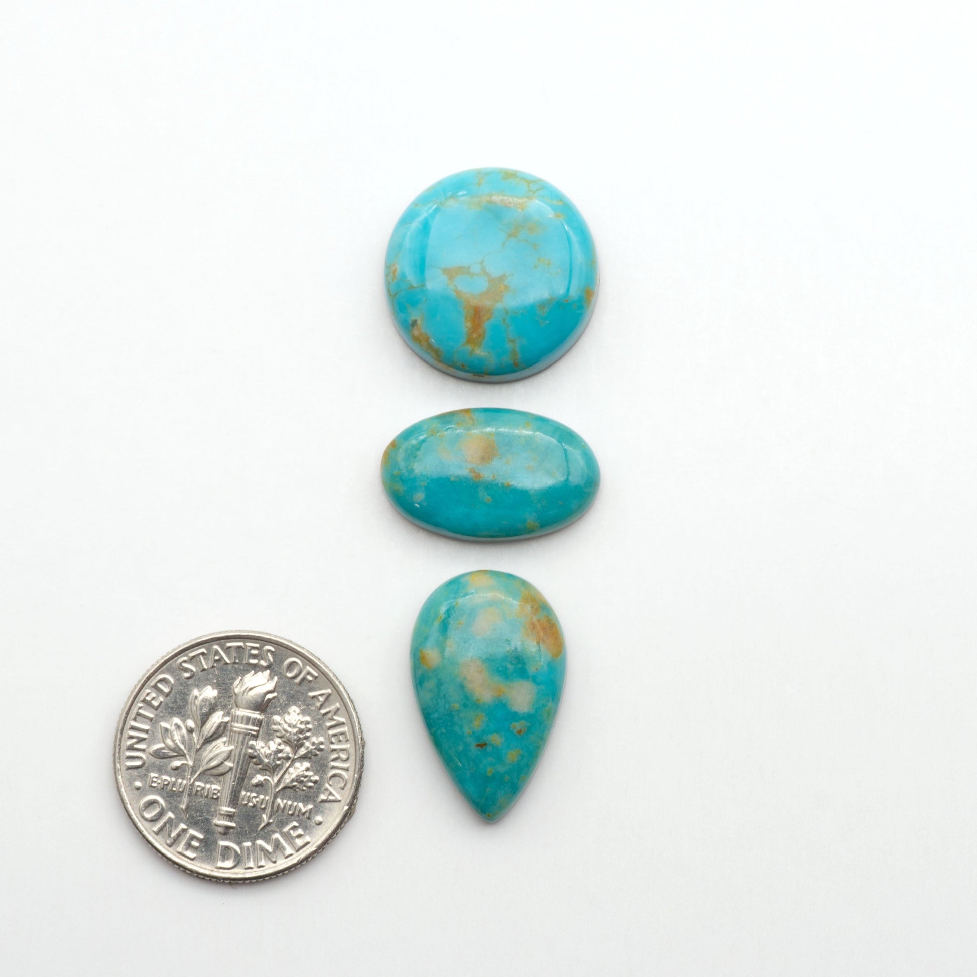 Nacozari turquoise cabochons are striking gemstones known for their vibrant blue to greenish-blue colors and pyrite, these stones are prized in jewelry making.
