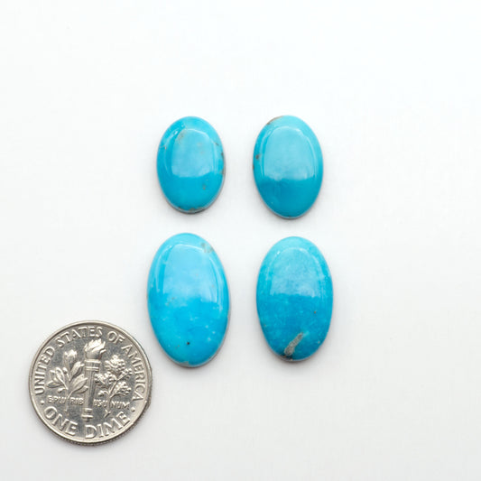 Nacozari turquoise cabochons are striking gemstones known for their vibrant blue to greenish-blue colors and pyrite, these stones are prized in jewelry making.