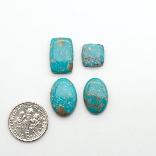 Nacozari turquoise cabochons are striking gemstones known for their vibrant blue to greenish-blue colors and pyrite, these stones are prized in jewelry making.