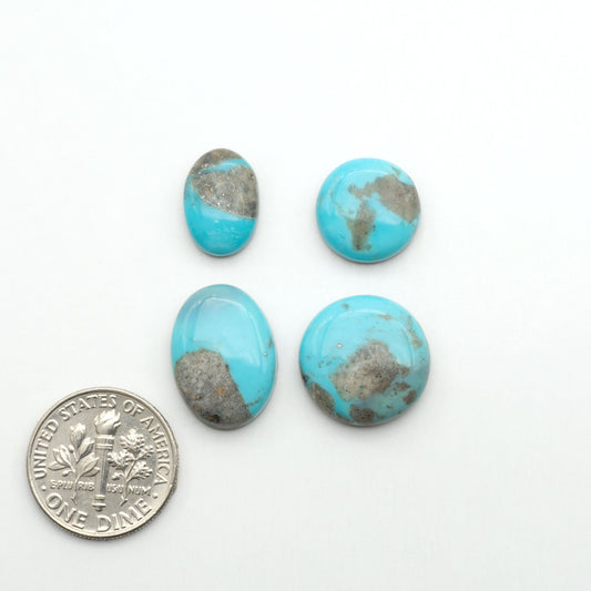 Nacozari turquoise cabochons are striking gemstones known for their vibrant blue to greenish-blue colors and pyrite, these stones are prized in jewelry making.