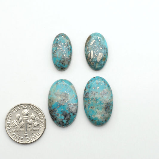 Nacozari turquoise cabochons are striking gemstones known for their vibrant blue to greenish-blue colors and pyrite, these stones are prized in jewelry making.