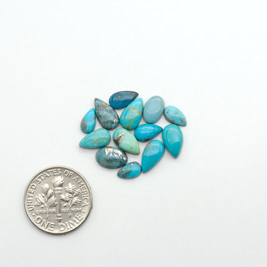 Nacozari turquoise cabochons are striking gemstones known for their vibrant blue to greenish-blue colors and pyrite, these stones are prized in jewelry making.