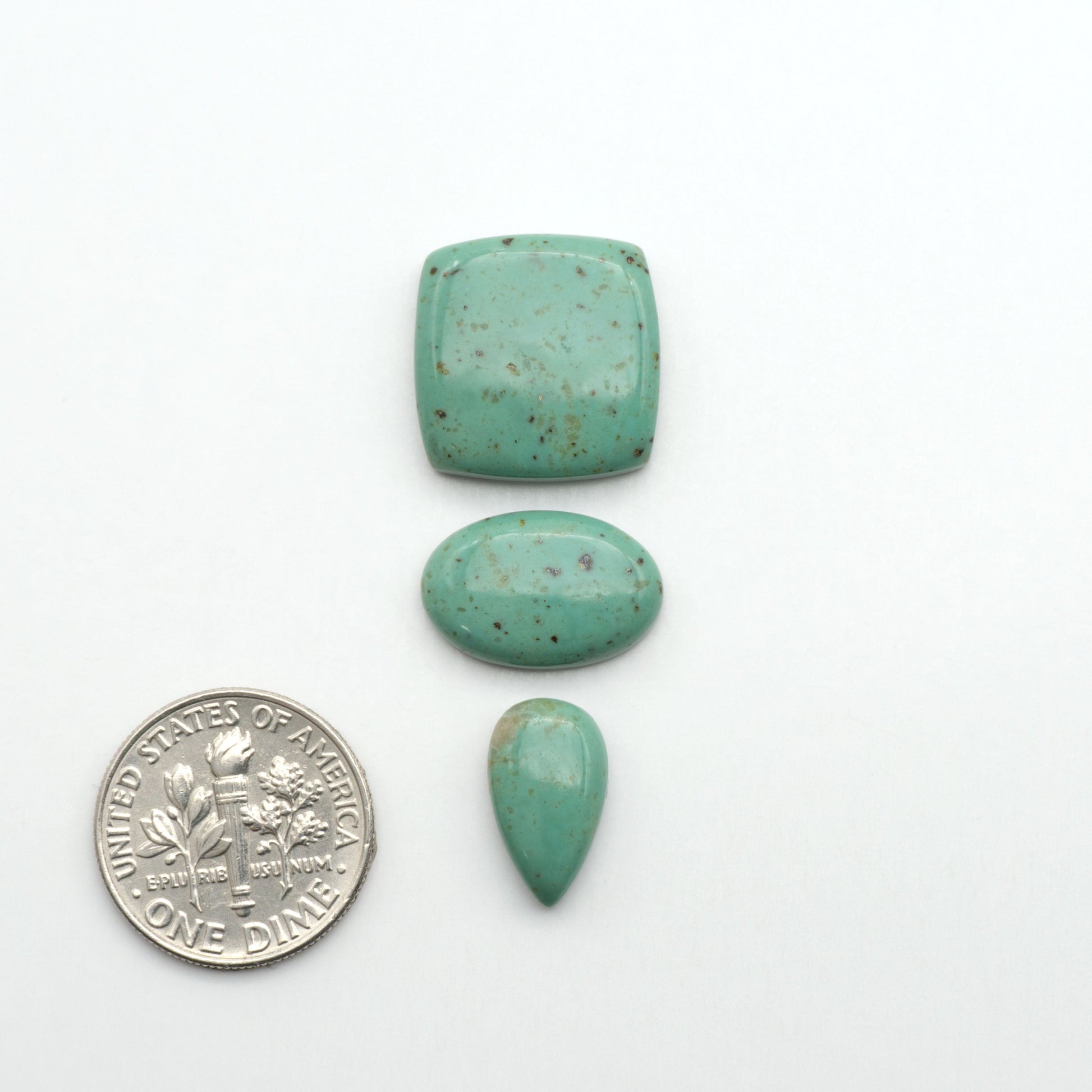 Nacozari turquoise cabochons are striking gemstones known for their vibrant blue to greenish-blue colors and pyrite, these stones are prized in jewelry making.