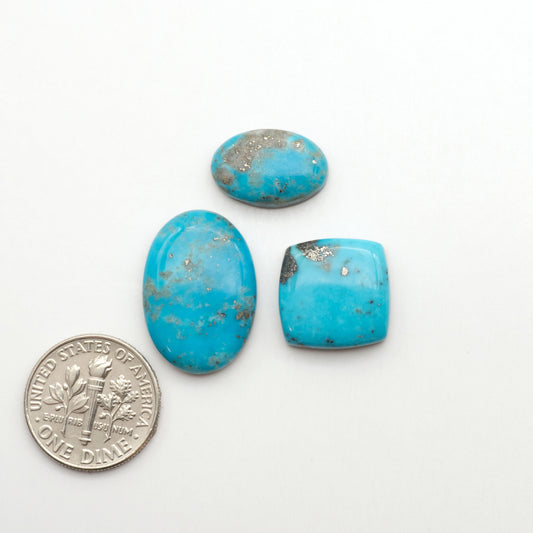 Nacozari turquoise cabochons are striking gemstones known for their vibrant blue to greenish-blue colors and pyrite, these stones are prized in jewelry making.