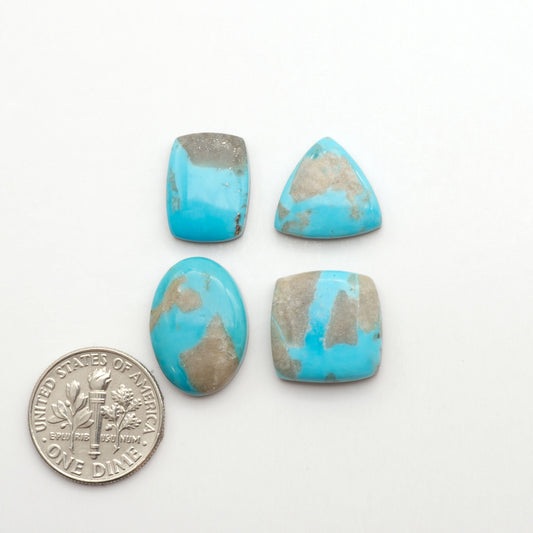 Nacozari turquoise cabochons are striking gemstones known for their vibrant blue to greenish-blue colors and pyrite, these stones are prized in jewelry making.