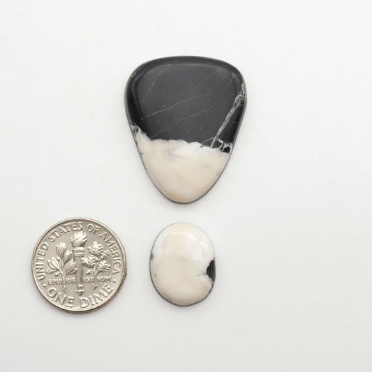 Natural White Buffalo Stone Cabochons are semi-precious gemstones cut into shapes ideal for jewelry-making, making them an excellent choice for artisans.