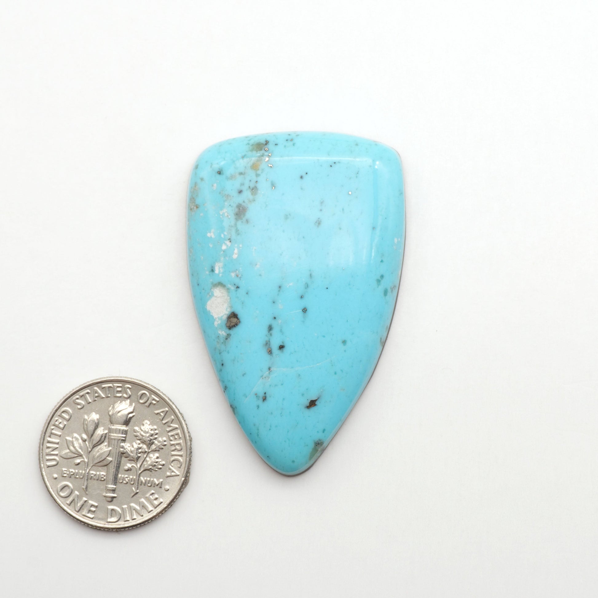 Nacozari turquoise cabochons are striking gemstones known for their vibrant blue to greenish-blue colors and pyrite, these stones are prized in jewelry making.