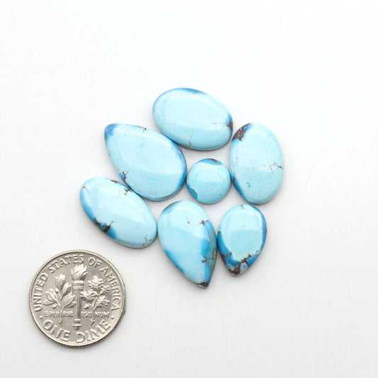 Discover the beauty of Natural Golden Hills Turquoise—prized for its icy blue tones, golden matrix, and exceptional quality. Ideal for artisan jewelry designs.