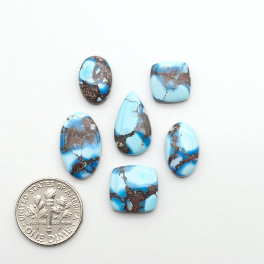 Discover the beauty of Natural Golden Hills Turquoise—prized for its icy blue tones, golden matrix, and exceptional quality. Ideal for artisan jewelry designs.