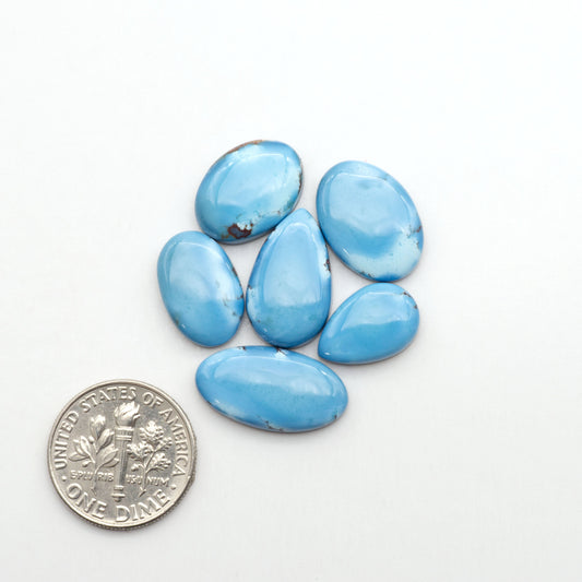 Discover the beauty of Natural Golden Hills Turquoise—prized for its icy blue tones, golden matrix, and exceptional quality. Ideal for artisan jewelry designs.