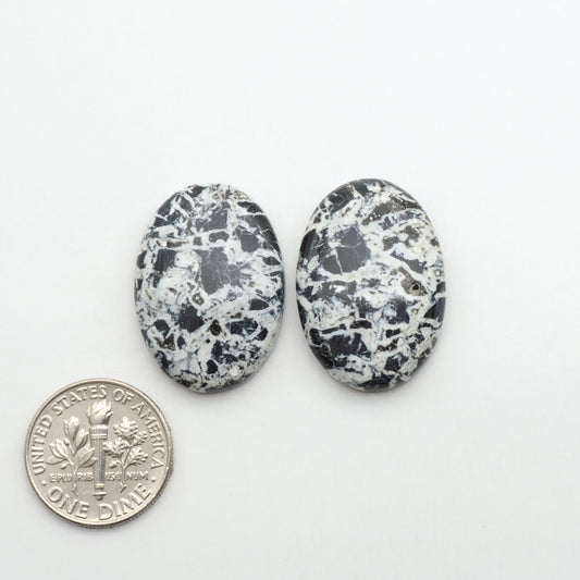 Natural White Buffalo Stone Cabochons are semi-precious gemstones cut into shapes ideal for jewelry-making, making them an excellent choice for artisans.