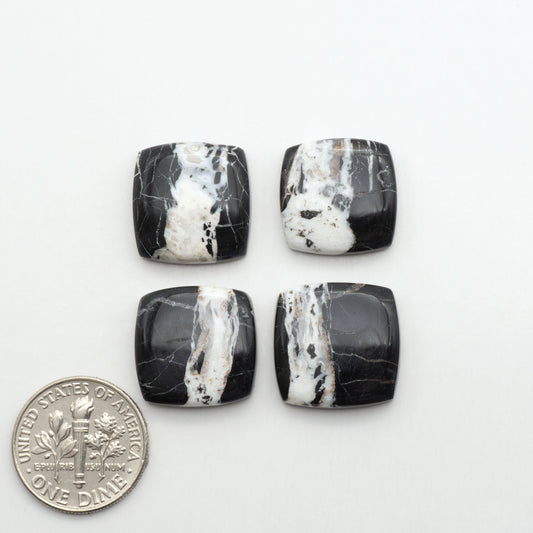 Natural White Buffalo Stone Cabochons are semi-precious gemstones cut into shapes ideal for jewelry-making, making them an excellent choice for artisans.