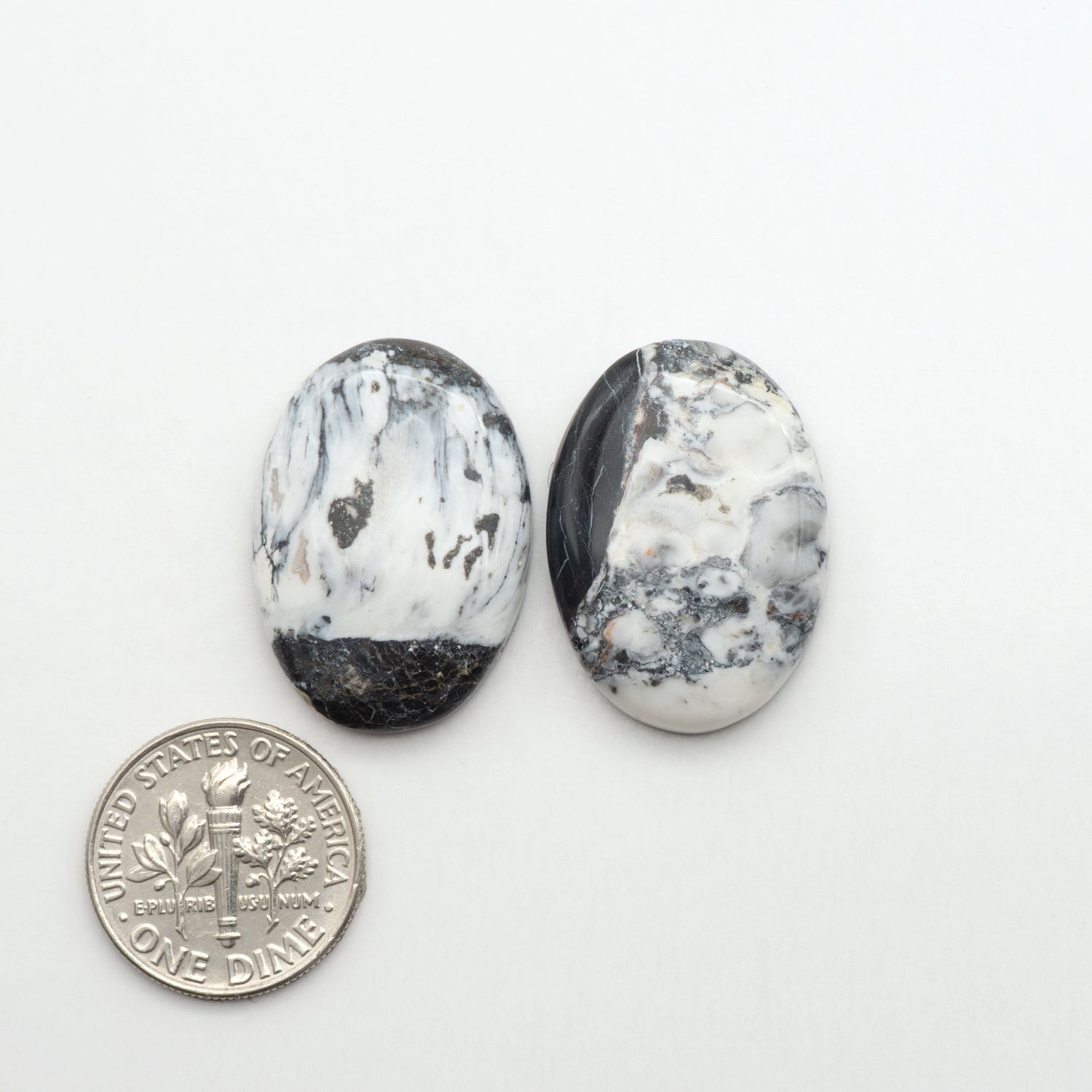 Natural White Buffalo Stone Cabochons are semi-precious gemstones cut into shapes ideal for jewelry-making, making them an excellent choice for artisans.