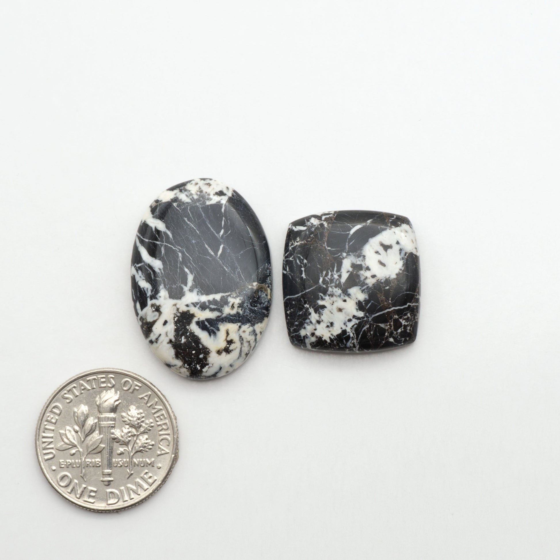 Natural White Buffalo Stone Cabochons are semi-precious gemstones cut into shapes ideal for jewelry-making, making them an excellent choice for artisans.