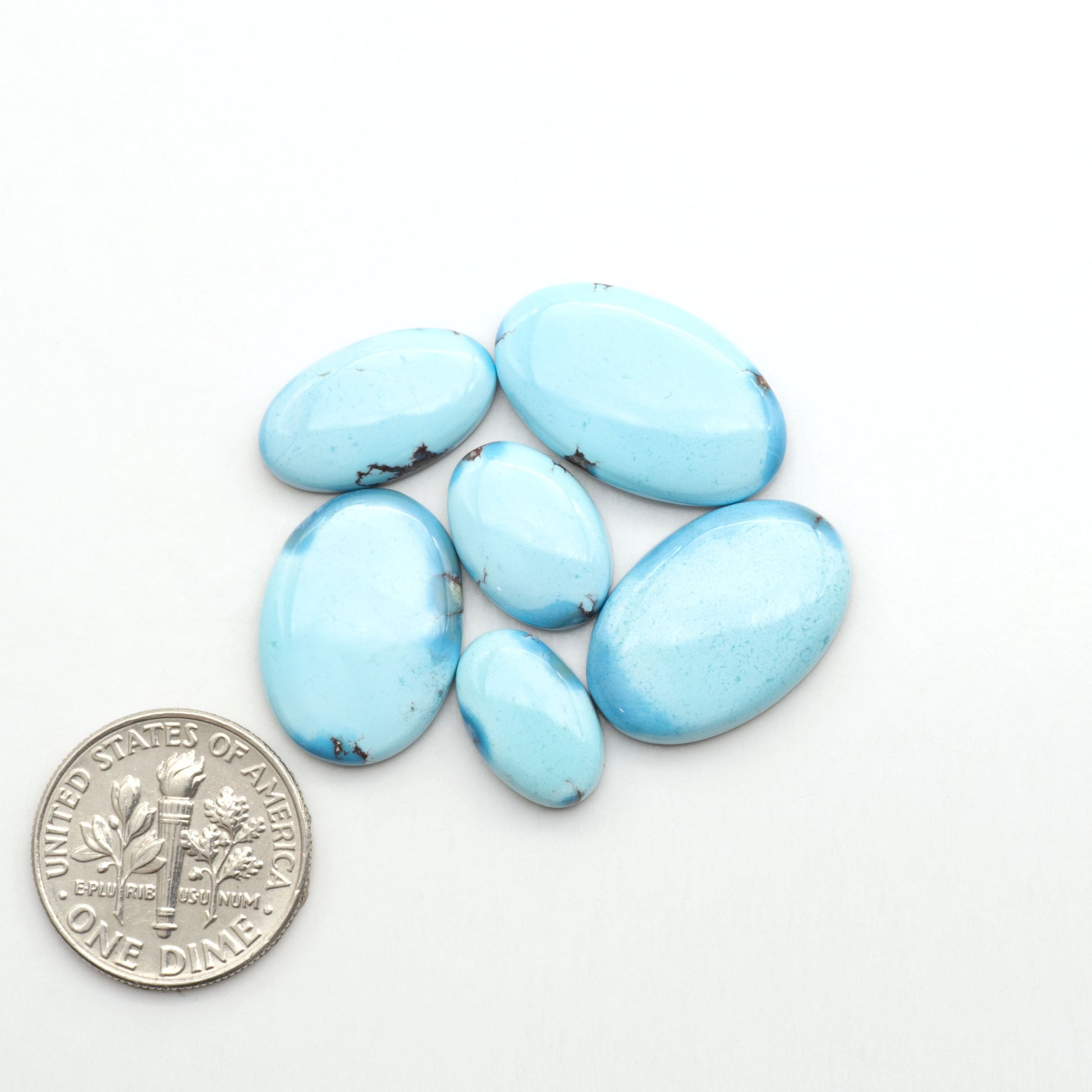 Discover the beauty of Natural Golden Hills Turquoise—prized for its icy blue tones, golden matrix, and exceptional quality. Ideal for artisan jewelry designs.