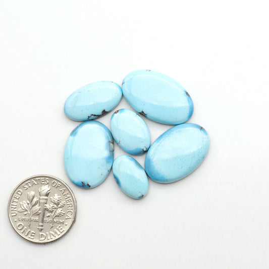 Discover the beauty of Natural Golden Hills Turquoise—prized for its icy blue tones, golden matrix, and exceptional quality. Ideal for artisan jewelry designs.