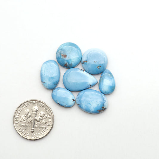 Discover the beauty of Natural Golden Hills Turquoise—prized for its icy blue tones, golden matrix, and exceptional quality. Ideal for artisan jewelry designs.