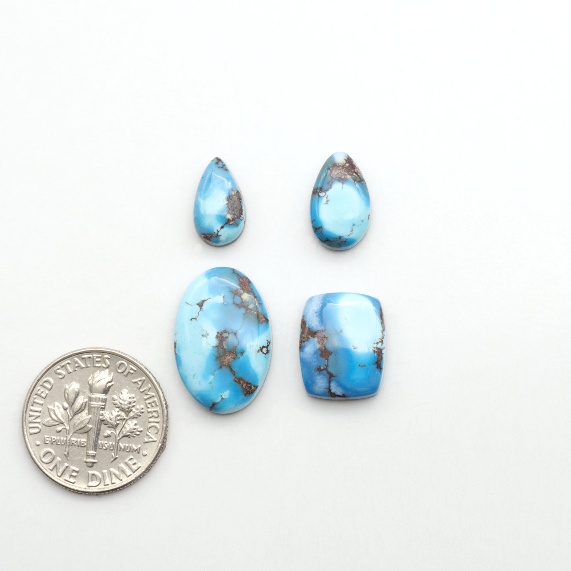 Discover the beauty of Natural Golden Hills Turquoise—prized for its icy blue tones, golden matrix, and exceptional quality. Ideal for artisan jewelry designs.