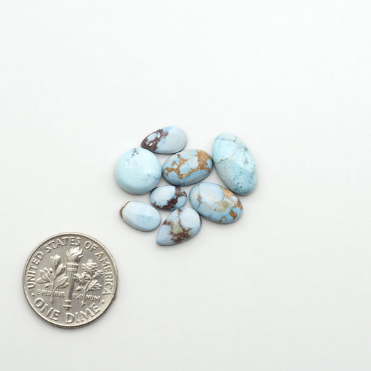Discover the beauty of Natural Golden Hills Turquoise—prized for its icy blue tones, golden matrix, and exceptional quality. Ideal for artisan jewelry designs.