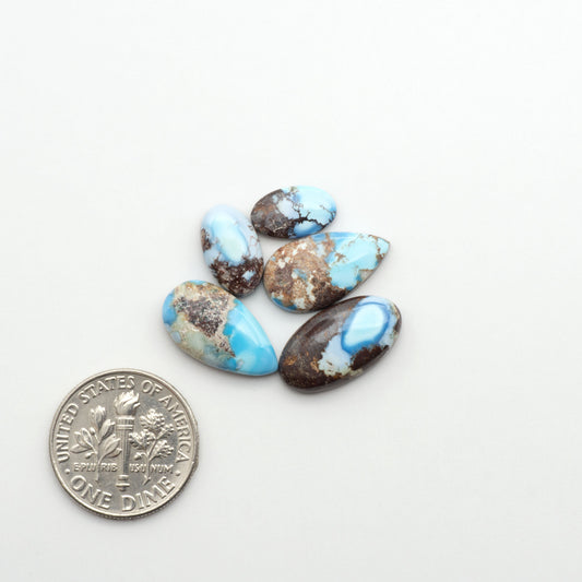 Discover the beauty of Natural Golden Hills Turquoise—prized for its icy blue tones, golden matrix, and exceptional quality. Ideal for artisan jewelry designs.