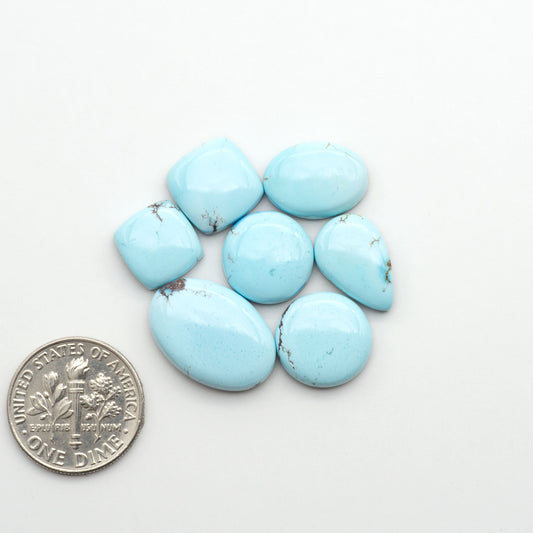 Discover the beauty of Natural Golden Hills Turquoise—prized for its icy blue tones, golden matrix, and exceptional quality. Ideal for artisan jewelry designs.