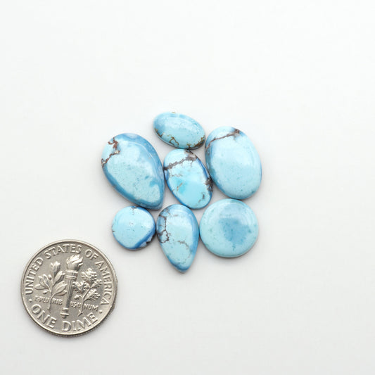 Discover the beauty of Natural Golden Hills Turquoise—prized for its icy blue tones, golden matrix, and exceptional quality. Ideal for artisan jewelry designs.