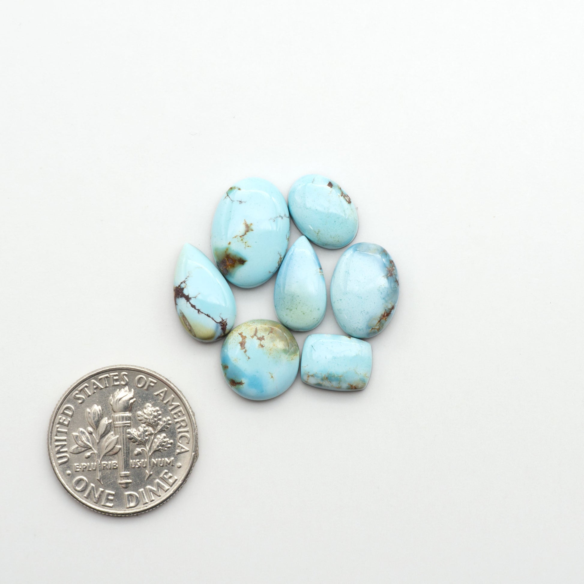 Discover the beauty of Natural Golden Hills Turquoise—prized for its icy blue tones, golden matrix, and exceptional quality. Ideal for artisan jewelry designs.