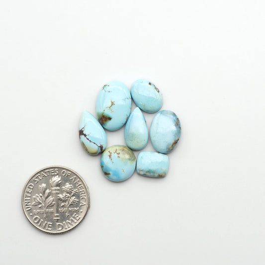 Discover the beauty of Natural Golden Hills Turquoise—prized for its icy blue tones, golden matrix, and exceptional quality. Ideal for artisan jewelry designs.