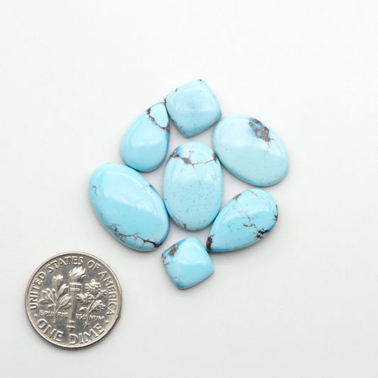 Discover the beauty of Natural Golden Hills Turquoise—prized for its icy blue tones, golden matrix, and exceptional quality. Ideal for artisan jewelry designs.