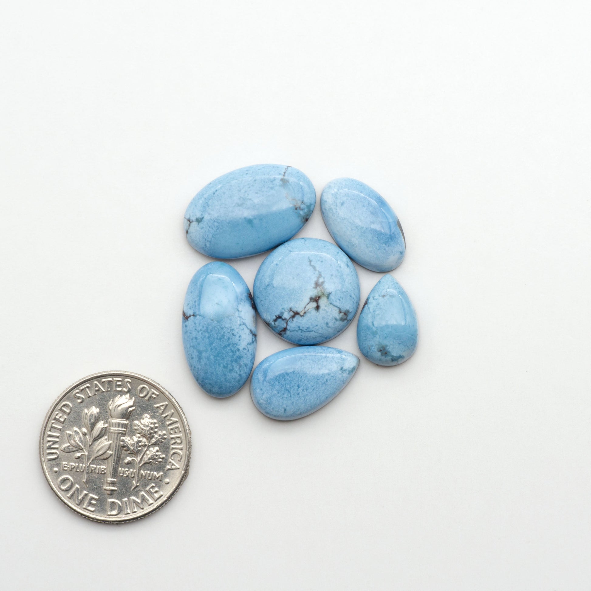Discover the beauty of Natural Golden Hills Turquoise—prized for its icy blue tones, golden matrix, and exceptional quality. Ideal for artisan jewelry designs.