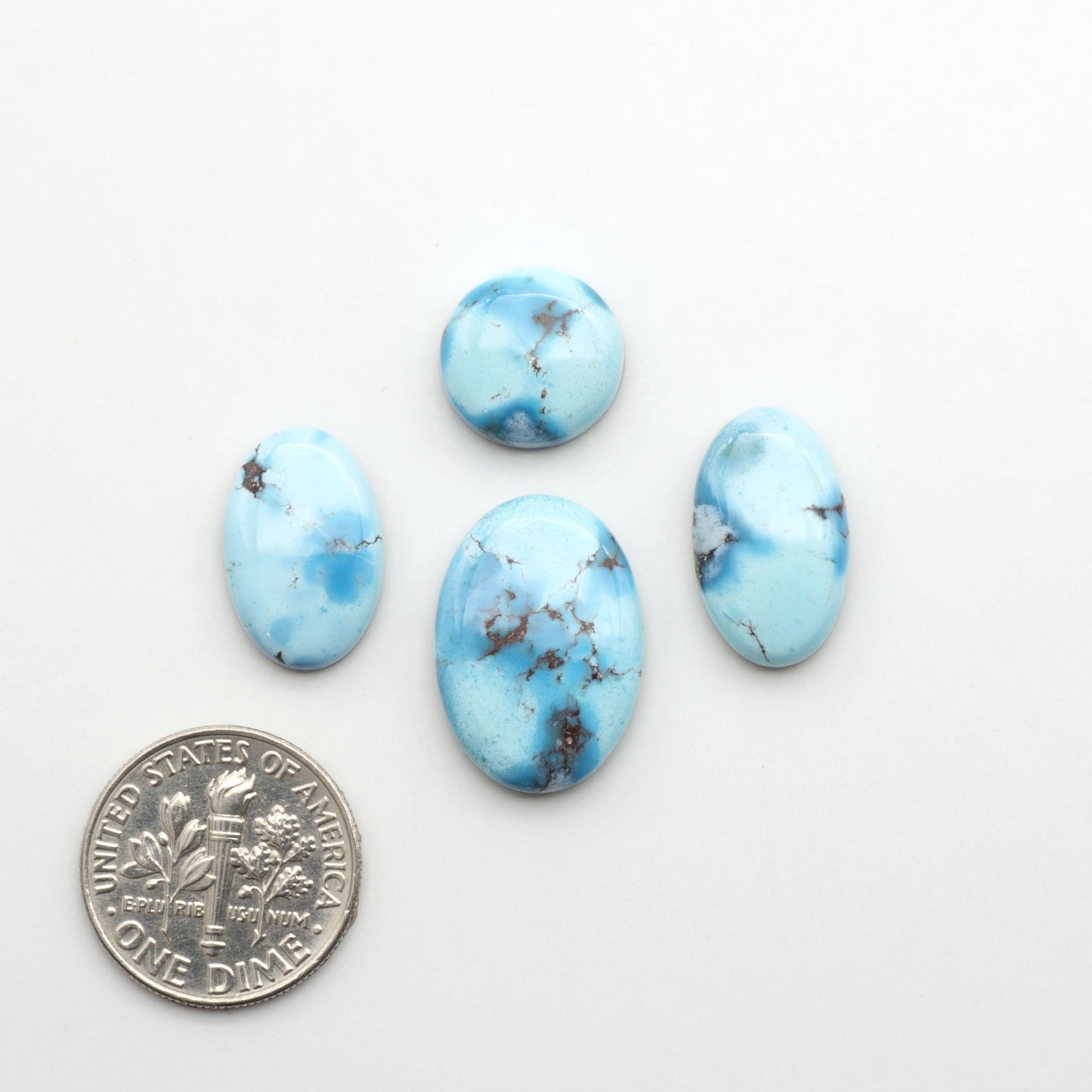 Discover the beauty of Natural Golden Hills Turquoise—prized for its icy blue tones, golden matrix, and exceptional quality. Ideal for artisan jewelry designs.