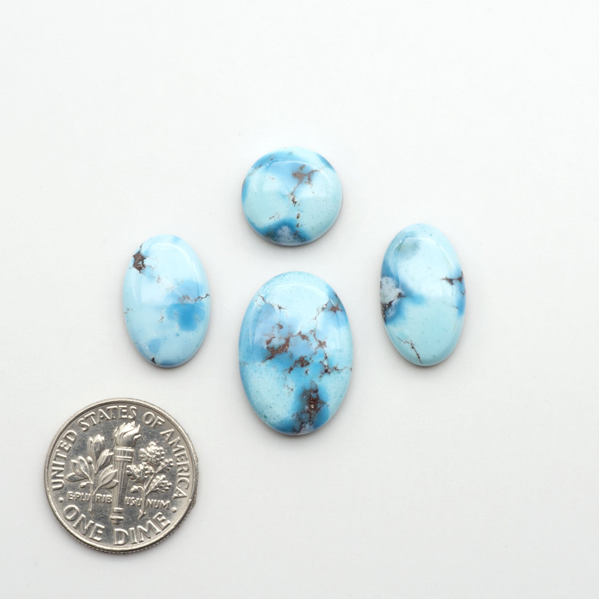 Discover the beauty of Natural Golden Hills Turquoise—prized for its icy blue tones, golden matrix, and exceptional quality. Ideal for artisan jewelry designs.
